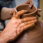 Doug Fitch and Hannah McAndrew making a jug for me